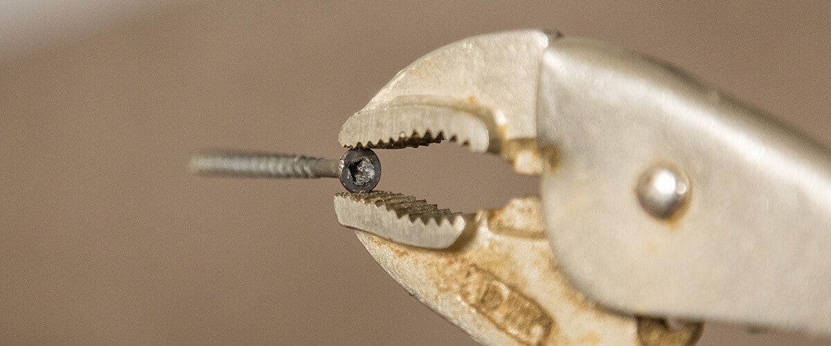 Removing stripped nut with pliers